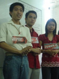 rtrday2 STAND-UP CMC Chairperson candidate Rupert Mangilit talks to the students during a room-to-room campaign. With him are USC Councilor candidates and Marian Santos