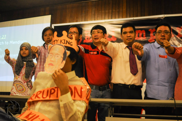 IMPUNITY KING. Members of the End Impunity Alliance show their distaste for government inaction. Photo by Demerie Dangla, UP Aperture
