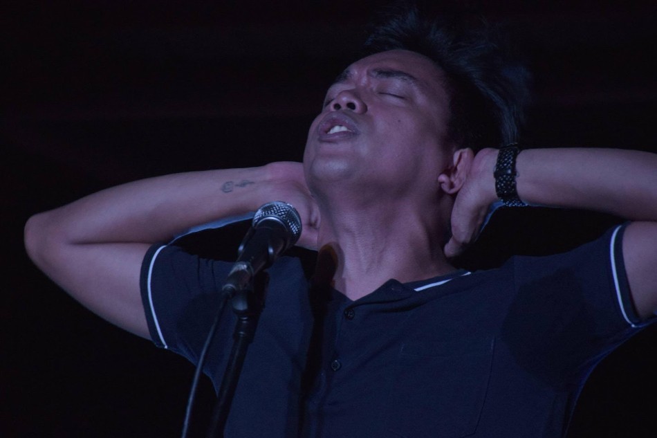 Word poet Juan Miguel Severo performs at a Taysan 3 bail fundraiser launched by Task Force FrEEDom at the College of Fine Arts. Photo by Arianne Christian Tapao